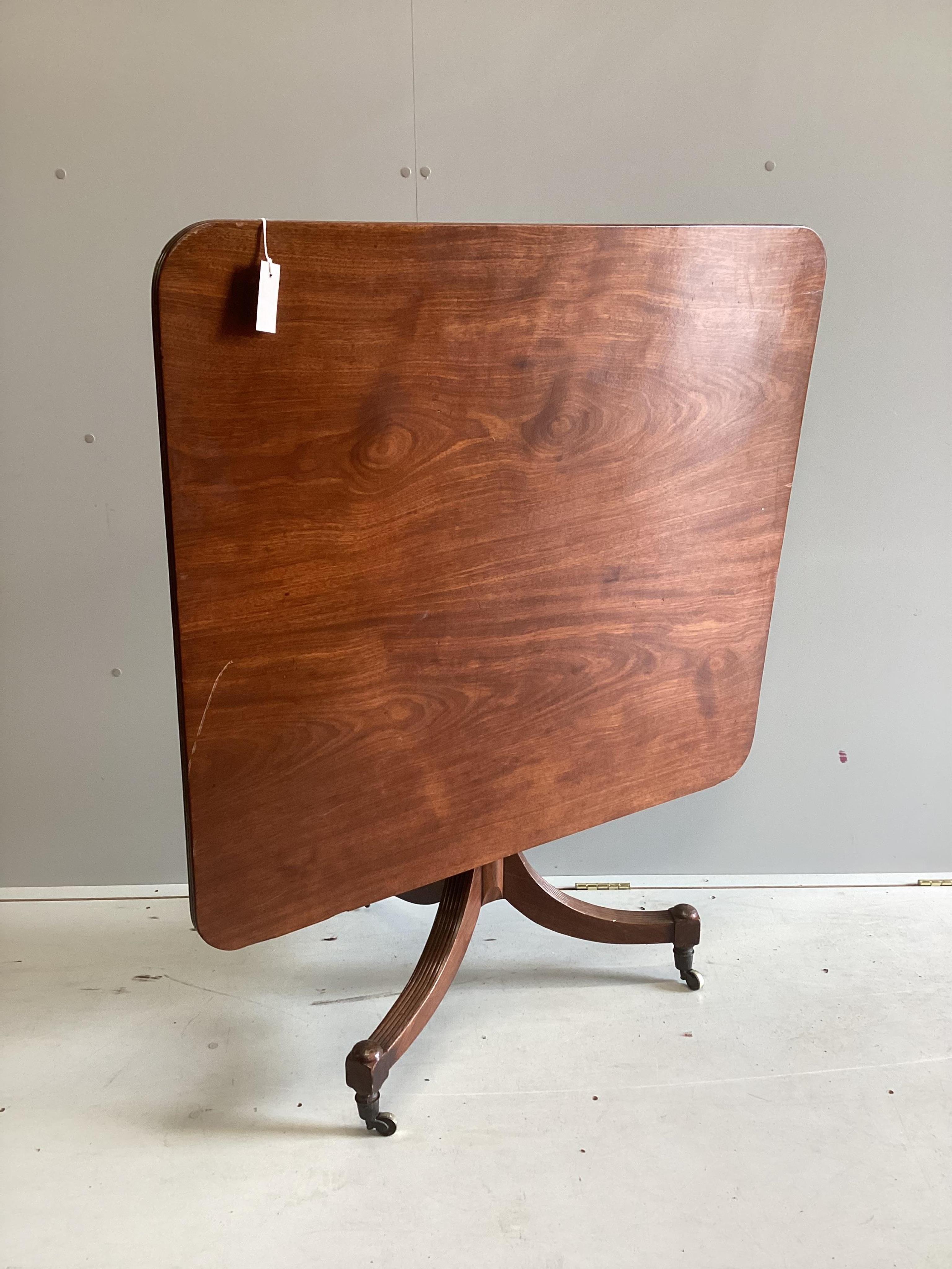 A Regency rectangular mahogany tilt top breakfast table, width 101cm, depth 91cm, height 72cm. Condition - fair
